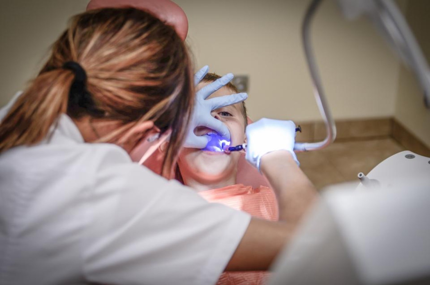 Dentist treating a relaxed patient